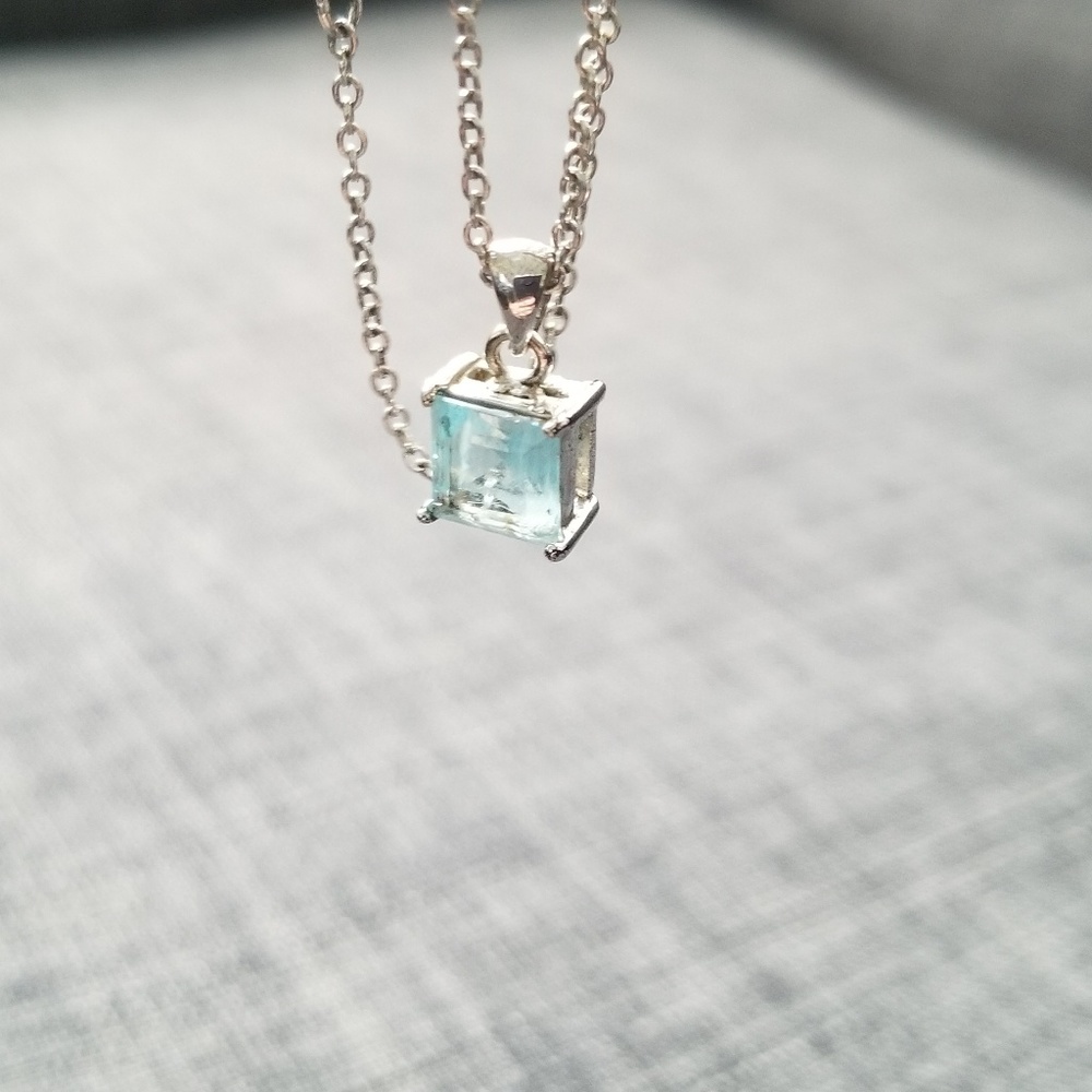 Sterling silver and blue topaz necklace